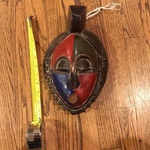 African hanging mask 12” long and 8” wide